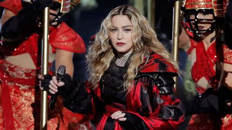 Madonna Pulls Fans Top Down Onstage During Australia Show