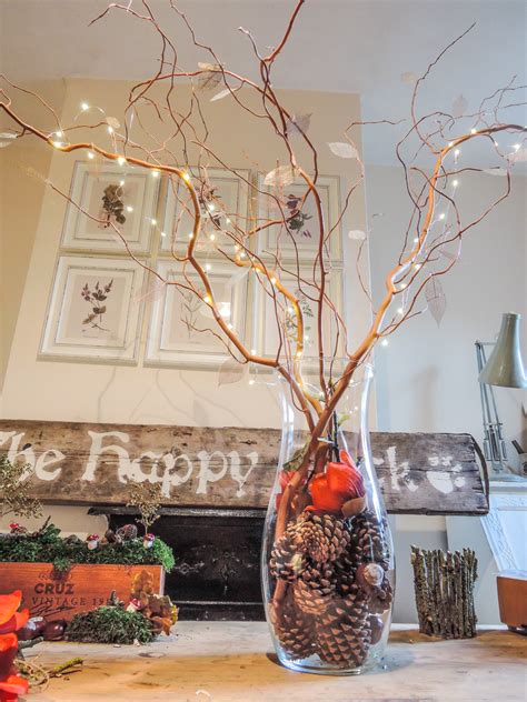 A Handmade Cottage Fairy Light Tree Centrepiece For Autumn Weddings