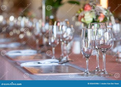 Champagne And Wine Glasses On Decorated Table At Wedding Reception