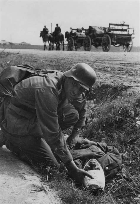 Ssonne91 “a German Soldier Helps A Wounded Comrade At Eastern Front
