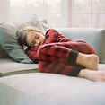 "Cute Young Girl In Pajamas Sleeping On A Big Chair" by Stocksy ...