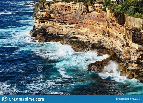 Pacific Ocean Waves On Sandstone Cliffs Australia Stock Photo Image
