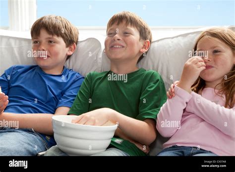 Kids Watching Tv And Eating