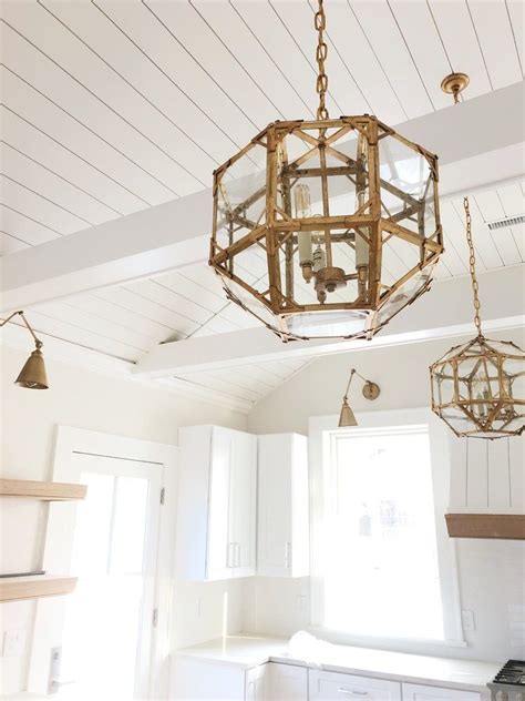 How to create a fireplace wood feature wall a modern. White kitchen with shiplap vaulted ceiling, custom shiplap ...