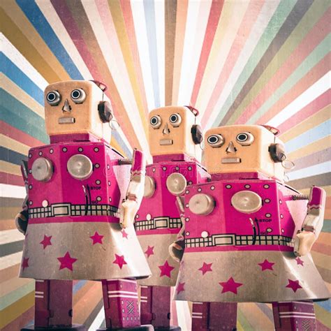 Three Girl Robot Toys Looking Forward Stock Photo Image Of Faith