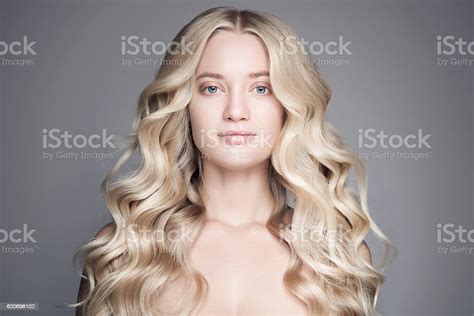 Beautiful Young Blond Woman With Long Wavy Hair Stock Photo Download