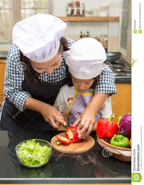 Mother Teaching Daughter Making Salad Stock Photo Image Of Preparing