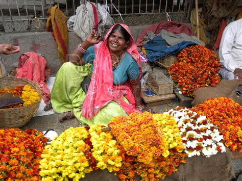 Now a days flower marketing is in the process of a metamorphosis in bangladesh (hossain and rahman 1994:5) today the trade of flowers is a burgeoning trade and a number of florists have sprung up who sell flowers (cultural reporter, 2002:10). Photo of Flower Seller by Photo Stock Source market ...