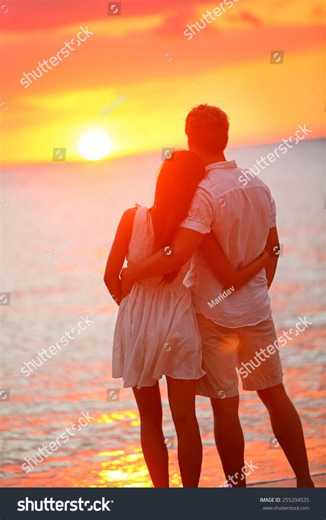 Honeymoon Couple Romantic In Love At Beach Sunset Newlywed Happy Young
