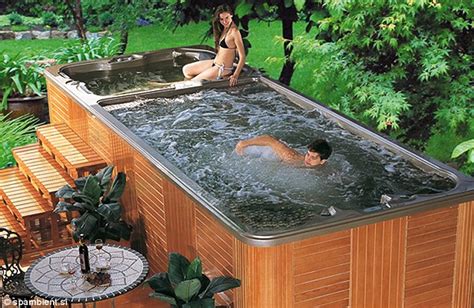 The Worlds Coolest Hot Tub The Two Tiered Jacuzzi Which Comes With Its Own Bar Flat Screen Tv