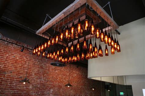 First, i poked a hole through the bottle cap for the wick. Beer, Booze, and the Beauty of Industrial Architecture ...