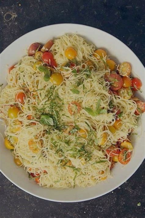 Summer garden pasta · 4 pints cherry tomatoes, halved · good olive oil · 2 tablespoons minced garlic (6 cloves) · 18 large basil leaves, julienned, plus extra for . Ina Garten Swears by This 6-Ingredient Summer Pasta Recipe ...