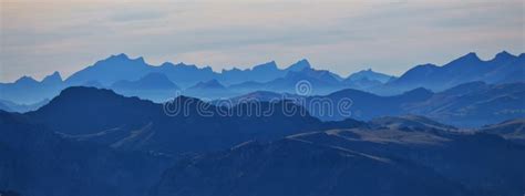 Silhouettes Of Mountains In The Swiss Alps Stock Photo Image Of