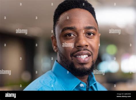 Portrait Of Confident Young African American Businessman At Workplace