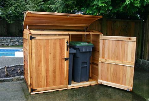 Raccoons have been tipping our trash for years, that is why we purchased our first outdoor wooden garbage can storage bin enclosure from bearicuda. outdoor trash shed - Google Search (With images) | Outdoor ...