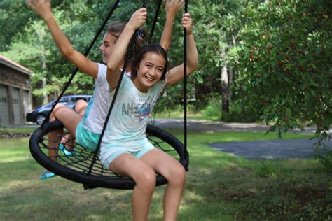 Another popular swing configuration is the swurfer swing installed on a cable between two trees. mommy bytes: How to Install a Swing Between Trees