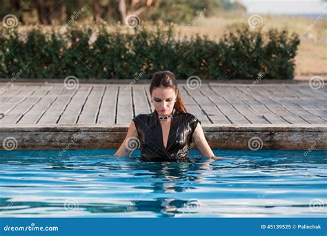 Wet Woman In Black Dress In A Swimming Pool Stock Image Image Of