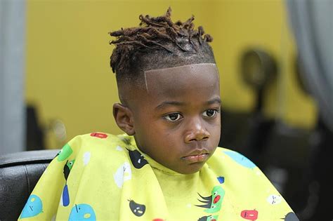 Fades and undercuts have enjoyed enduring popularity thanks to their mixture of easy styling with sharp looks, but long and. Short Dreads hairstyles for black boy | Boy braids ...