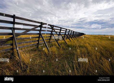 Wooden Snow Fence On The Prairie To Stop Drifting Snow From Piling Up