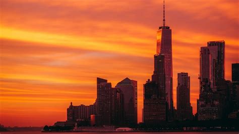 956985 Manhattan Skyline Sunset Clouds Usa New York City One
