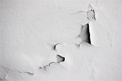 Background Texture Of White Grunge Concrete Wall With Peeling Paint