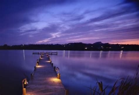 Dock Down By The Water Lake Lights Night Purple Water Wonders