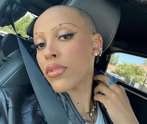 planet her rapper doja cat took to twitter to address critics of her buzzed haircut which she