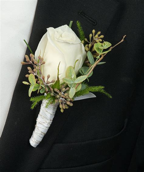 About White Rose Boutonniere From Walter Knoll Florist In Saint Louis Mo
