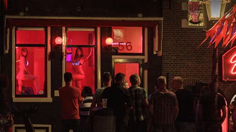 inside amsterdam s seedy red light district where brits flock for sex at 11 am despite officials