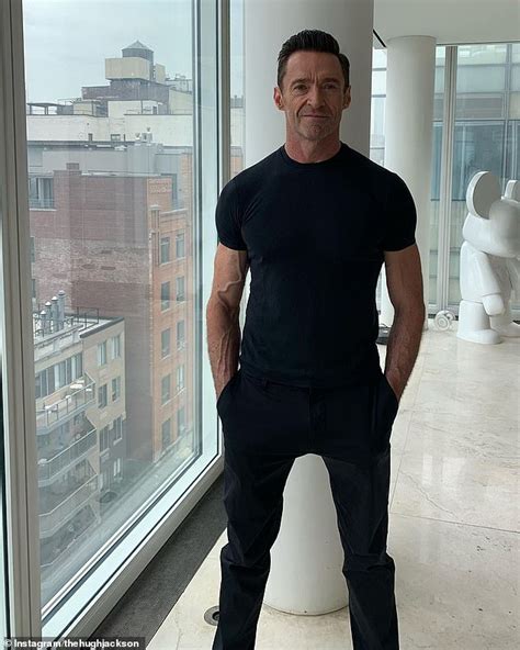 Hugh Jackman Flaunts His Very Vascular Arms In A Tight Black T Shirt As