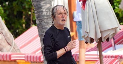 Paul Mccartney Gets Drenched As He Hits The Beach In St Barts With Wife Nancy Irish Mirror Online