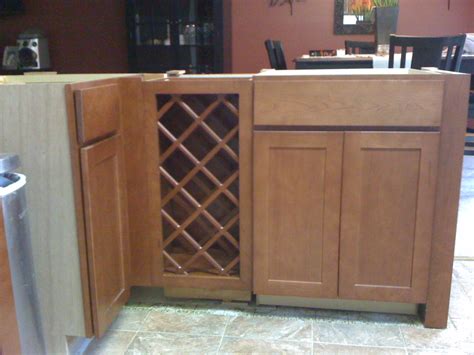 A wine rack is an excellent addition to most dining, kitchen and family rooms. Installing 30 inch base wine rack next to base cabinets (granite, dishwasher, glue) - House ...