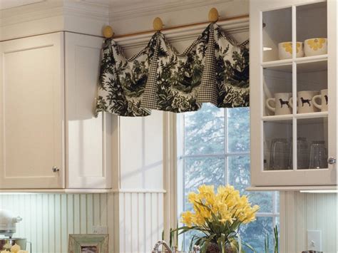 This box pleat valance has embellishments at the hem and the header. DIY Kitchen Window Treatments: Pictures & Ideas From HGTV ...