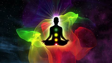 Seven Chakras Appearing Over A Person Gaining Enlightenment Silhouette