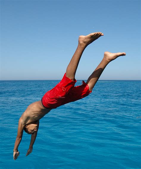 Boy Diving Into The Water Image Free Stock Photo Public Domain