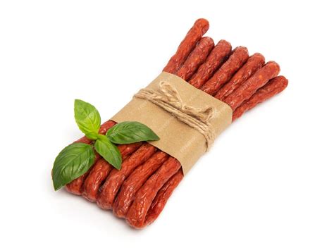 Premium Photo Thin Dry Smoked Pork Or Beef Meat Polish Kabanos Sausages Isolated On White