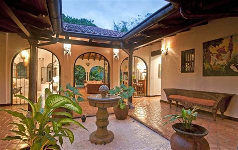 Browse spanish colonial, hacienda, courtyard, small, bungalow, and more designs! Image result for underground house plans with central ...