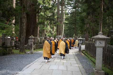 Monks Walking Through The Okunoin Cemetery Koyasan Japan