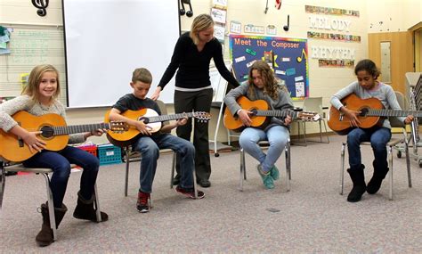 Medina Teacher Hopes Plea For Guitar Donations Strikes Chord With