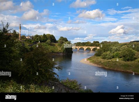 Marjoribanks Monument And Bridge Over The River Tweed At Coldstream