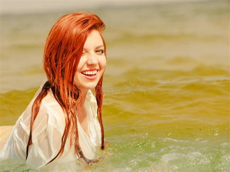 Redhead Woman Posing In Water During Summertime Stock Image Image Of Hair Summer 107996895