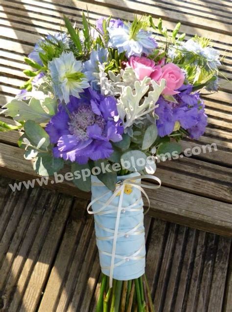 Bridal Bouquet Of Blue Scabious Blue Nigella Cream And Pink Roses And