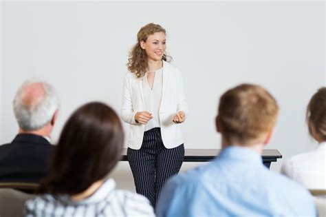 Business Woman Giving A Lecture Photo Free Download