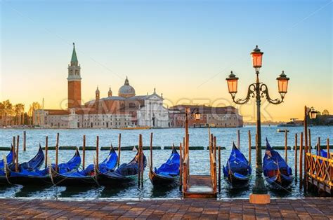 Gondolas And San Giorgio Maggiore Island Venice Italy Globephotos