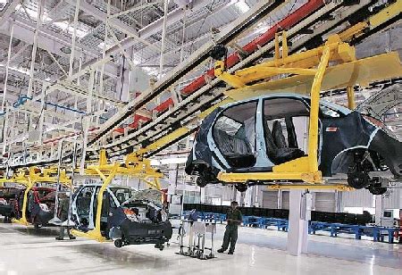 Tata Motors To Acquire Sanand Plant Signs Mou With Ford Gujarat Govt