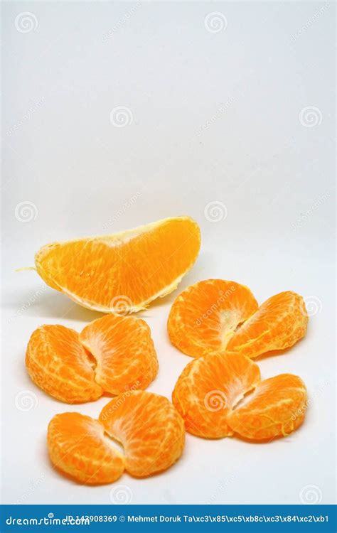 Peeled Orange And Mandarin Slices On White Isolated Background Stock