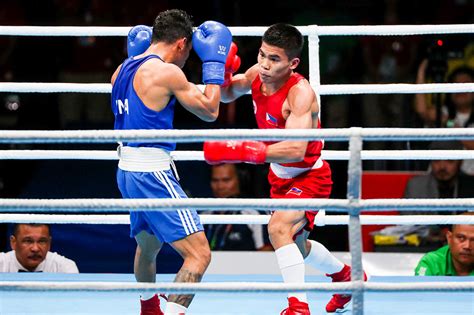 Carlo paalam was clinical against algerian mohamed flissi, boxing beautifully to flummox his much older foe throughout the fight. Boxing: Carlo Paalam flusters Afghan fighter, as Olympic dream in sight | ABS-CBN News
