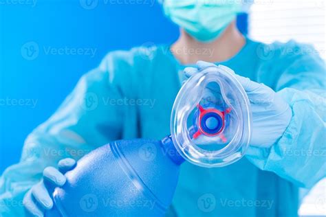 Nurse Doctor Hold Oxygen Mask Manual Pump To Camera Surgeon Medical