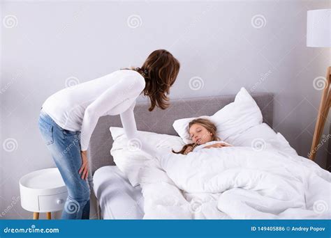 Mother Waking Up Her Daughter Stock Photo Image Of Little People