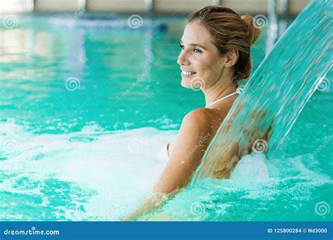 Portrait Of Beautiful Woman Relaxing In Swimming Pool Stock Photo Image Of Resort Massage